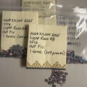 Swarovski • Color: Lt. Rose AB, 2028 XILION Rose Hotfix Rhinestones